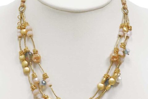 Collier court à perles dorées