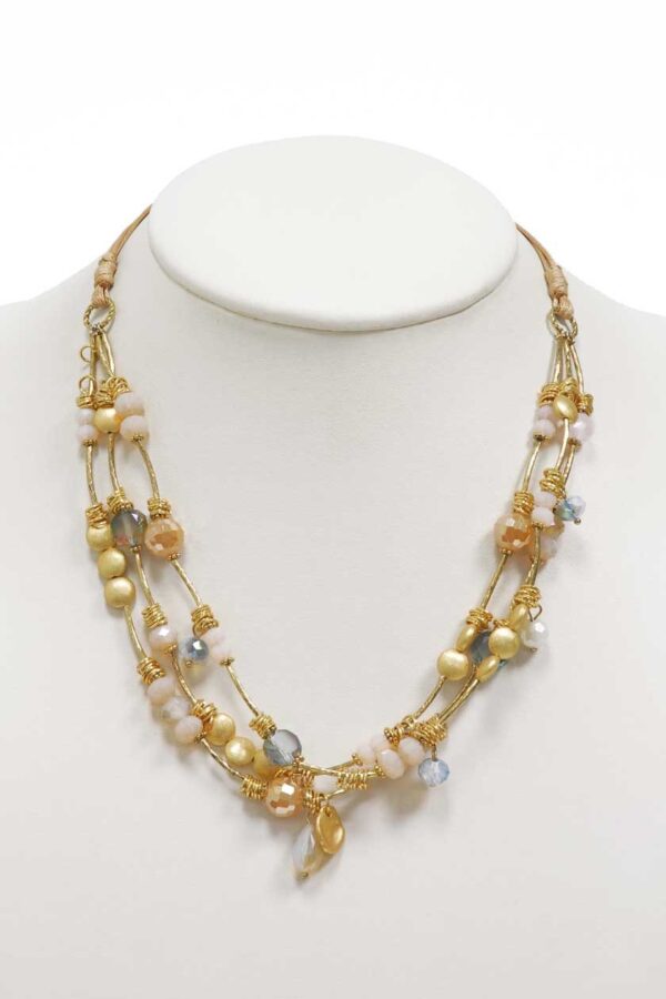 Collier court à perles dorées